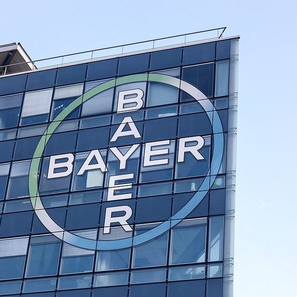 The Bayer logo on the side of a building.