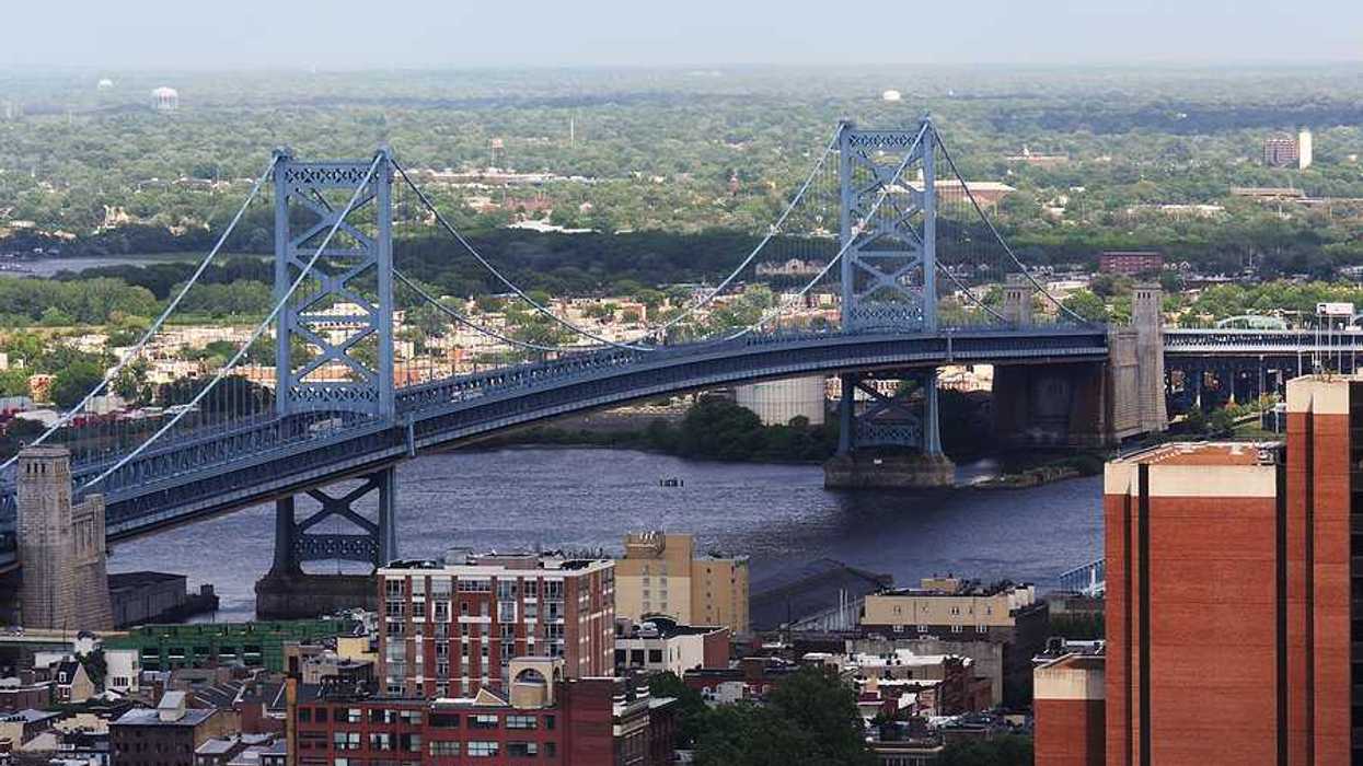 The Benjamin Franklin Bridge crossing the Delaware River flowing through Philadelphia