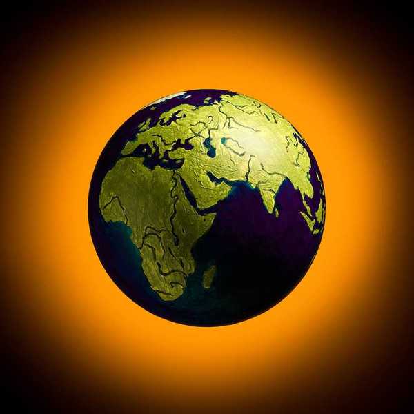 The concept of climate change. Planat earth on a fiery orange background.