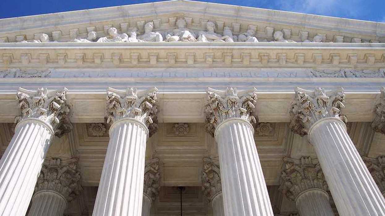 The facade of the Supreme Court viewed from below