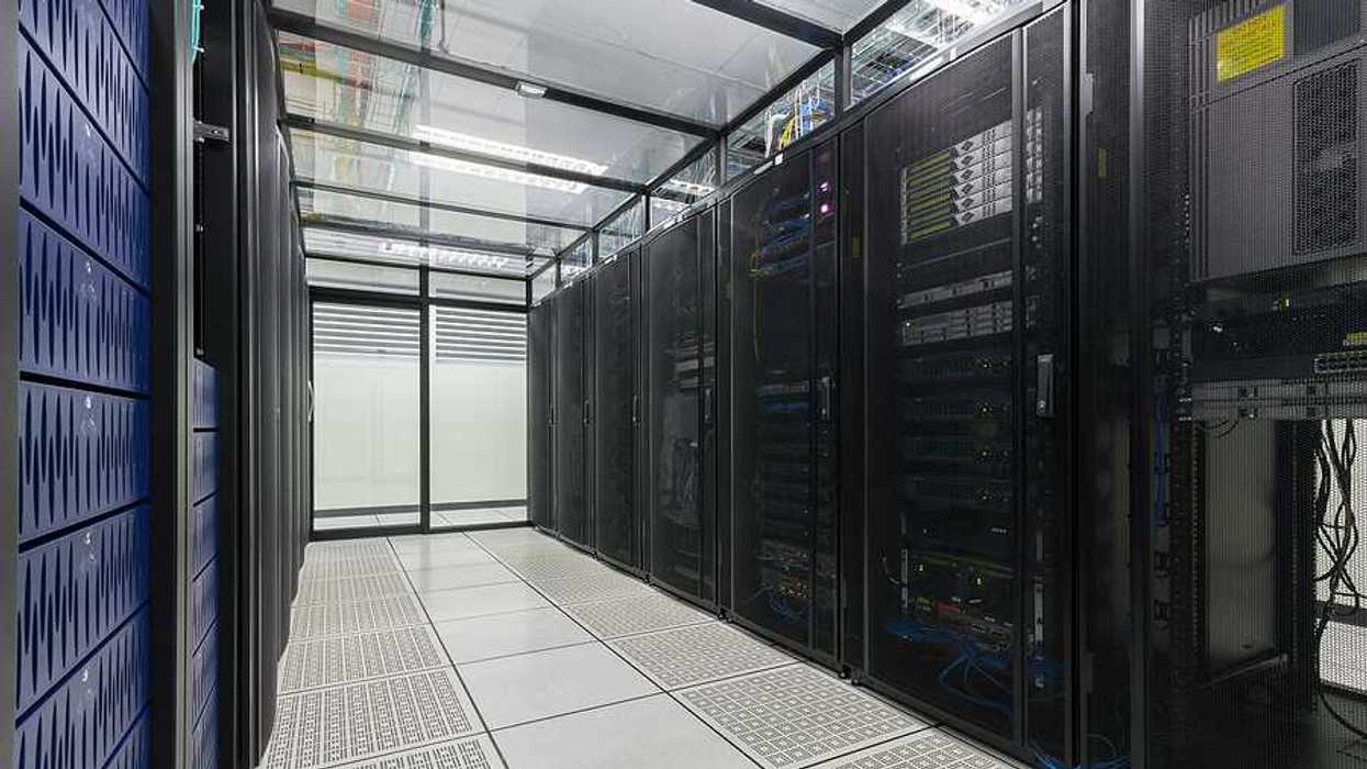 The interior of a data center with rows of servers
