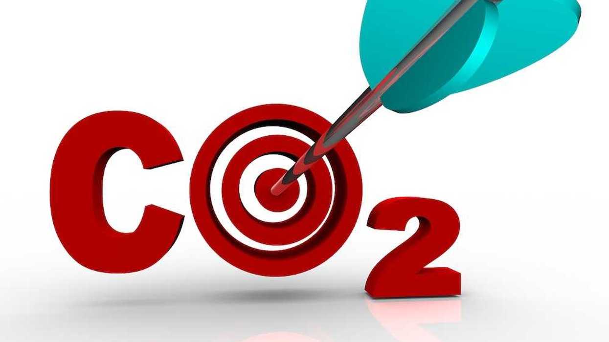 The letters CO2 representing Carbon Dioxide with a target bulls-eye in place of the O and an arrow hitting the middle of it, symbolizing a successful reduction of the harmful greenhouse gas