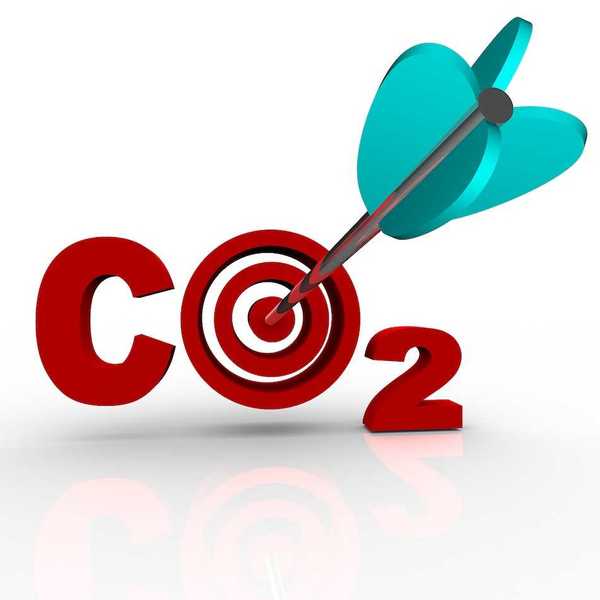 The letters CO2 representing Carbon Dioxide with a target bulls-eye in place of the O and an arrow hitting the middle of it, symbolizing a successful reduction of the harmful greenhouse gas