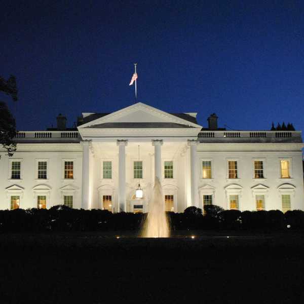 The White House illuminated at night.