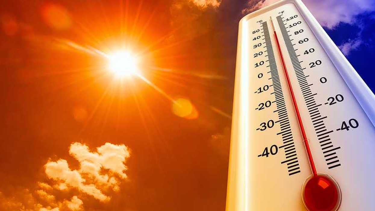 Thermometer with 100 degree reading superimposed against a scorching sunshiney sky