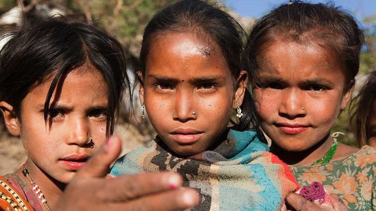 Three young Nepali girls looking into the camera