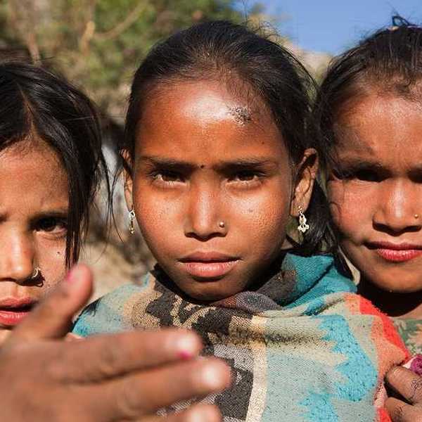 Three young Nepali girls looking into the camera