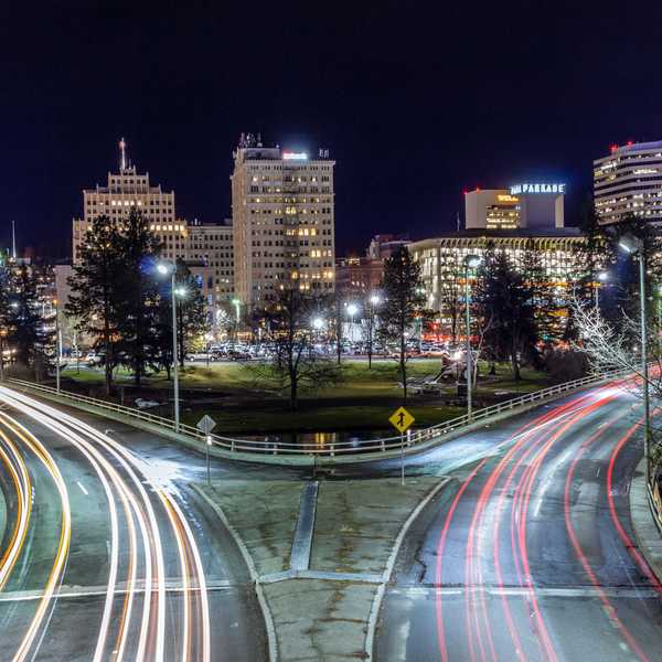 time lapse photography of city lights during night time