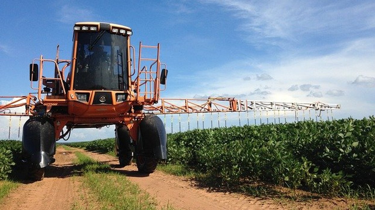 tractor spraying crops