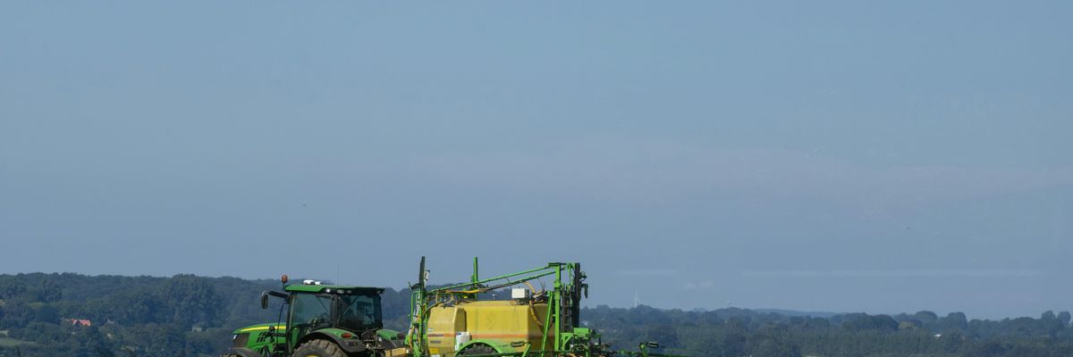 tractor spraying pesticides