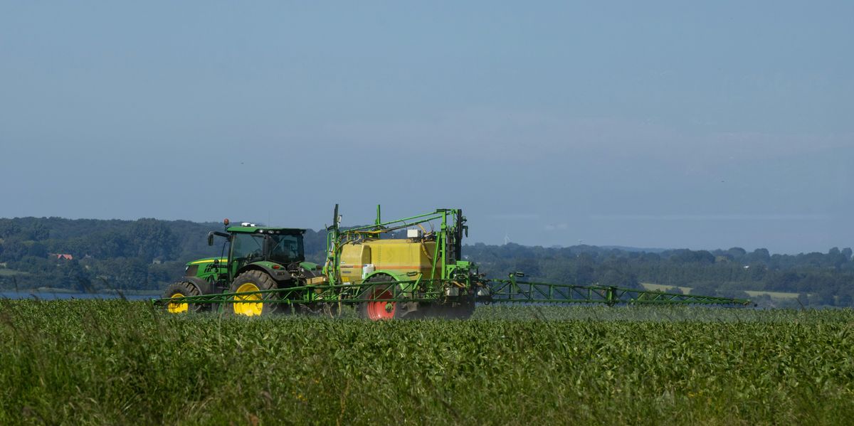 tractor spraying pesticides