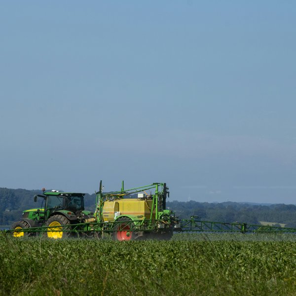 tractor spraying pesticides