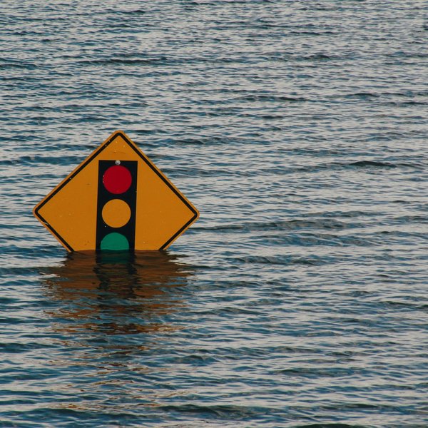 traffic sign in flood water
