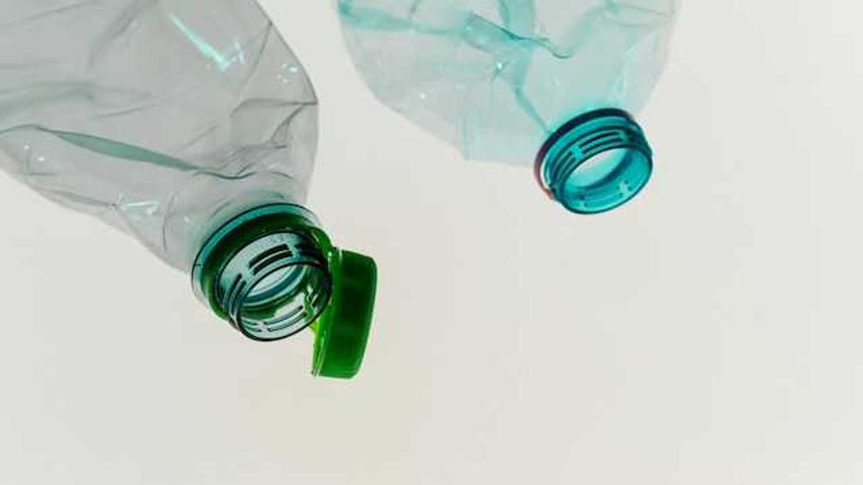 Two empty plastic bottles without the caps on