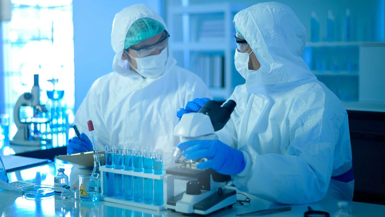 Two scientists working in the lab