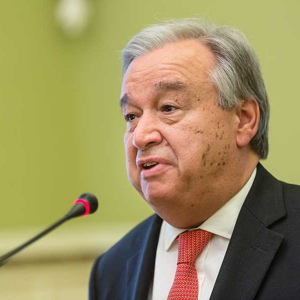United Nations Secretary-General Antonio Guterres speaking into microphone