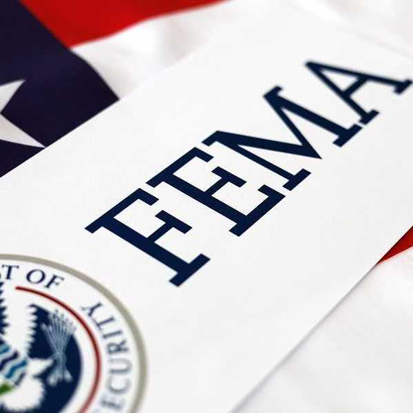 United State of America flag overlayed with FEMA logo and DHS seal