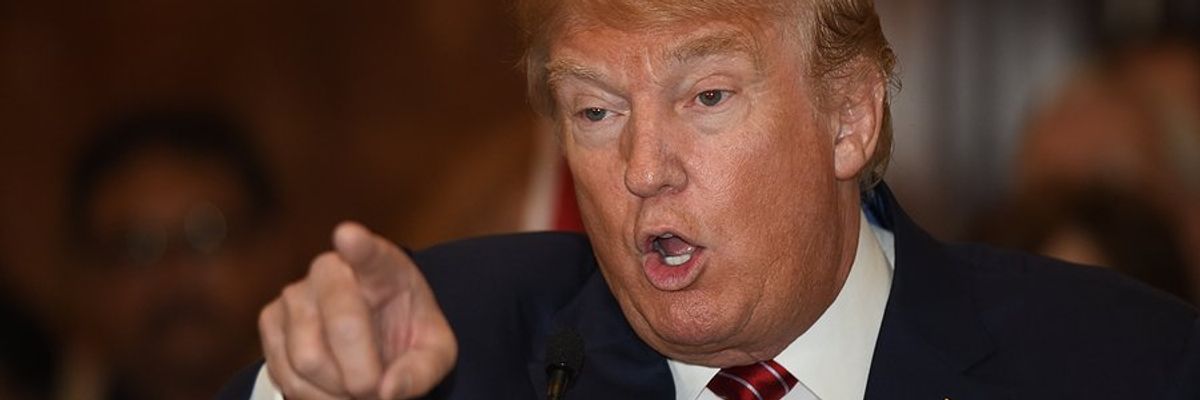 US President Donald Trump gesturing with pointing finger.