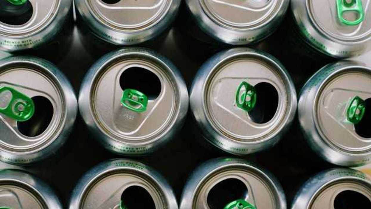 View from a group of aluminum soda cans from above, opened