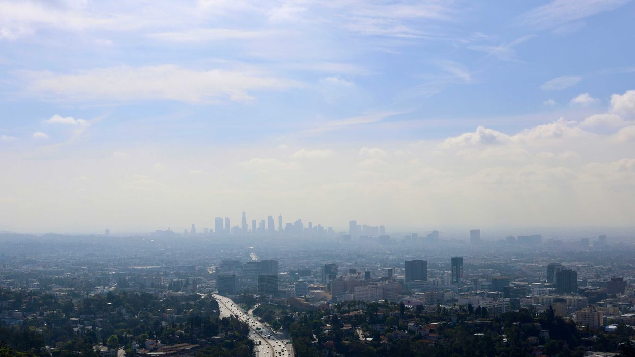 View of Los Angeles skyline shrouded in smog.