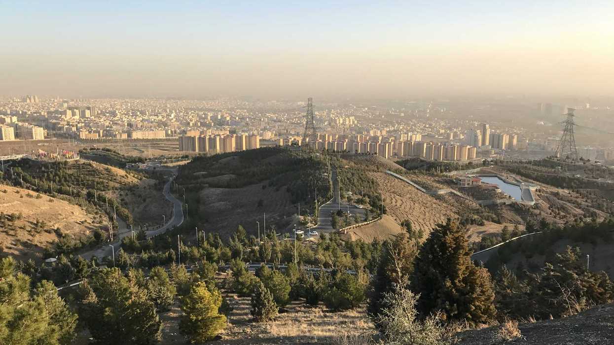 View of Tehran from a hillside with smog in the background