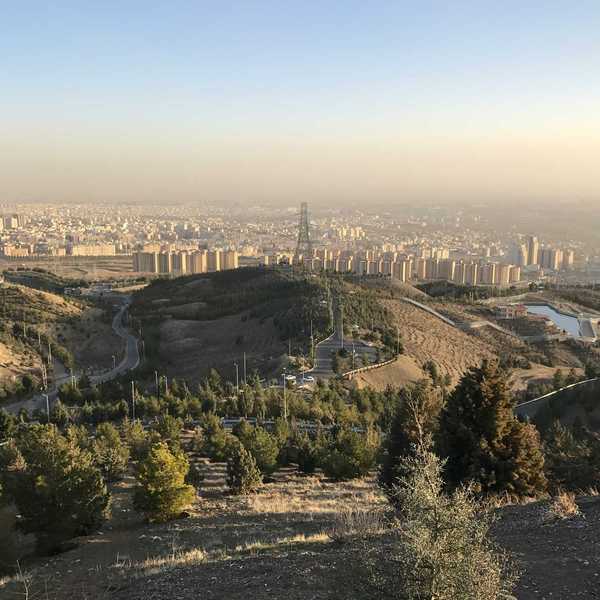 View of Tehran from a hillside with smog in the background