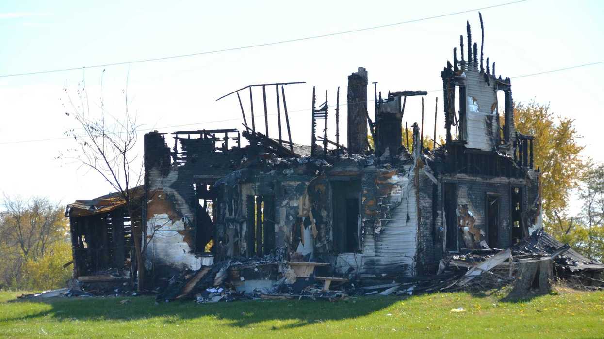 Walls of a burnt house completely destroyed by fire.