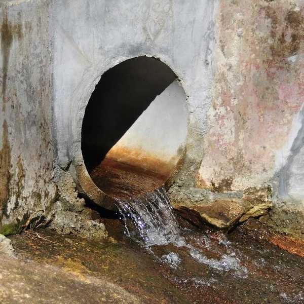 wastewater outflow directly discharging into waterway