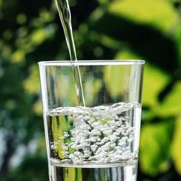 Water being poured into a glass