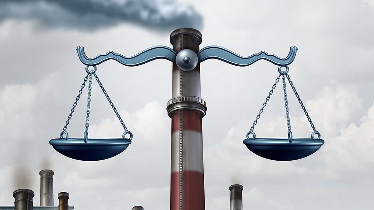 Weight scales on an image of a smokestack.