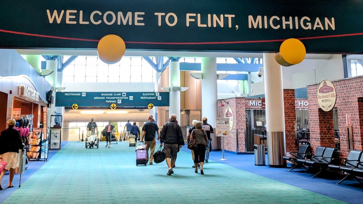 "Welcome to Flint, Michigan" sign in the Flint airport