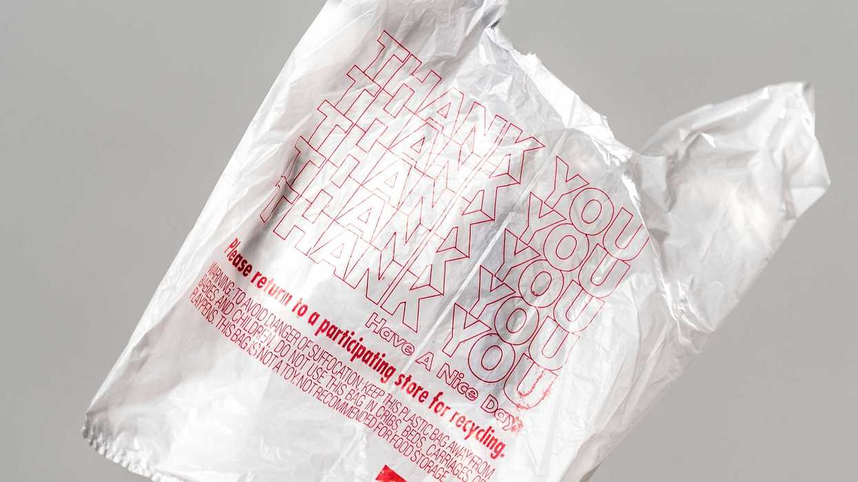 white plastic bag against grey background.