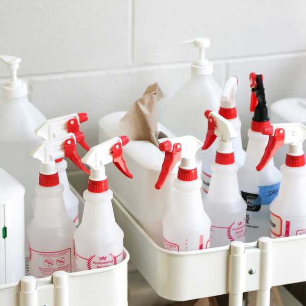 white plastic bottles on white plastic container.