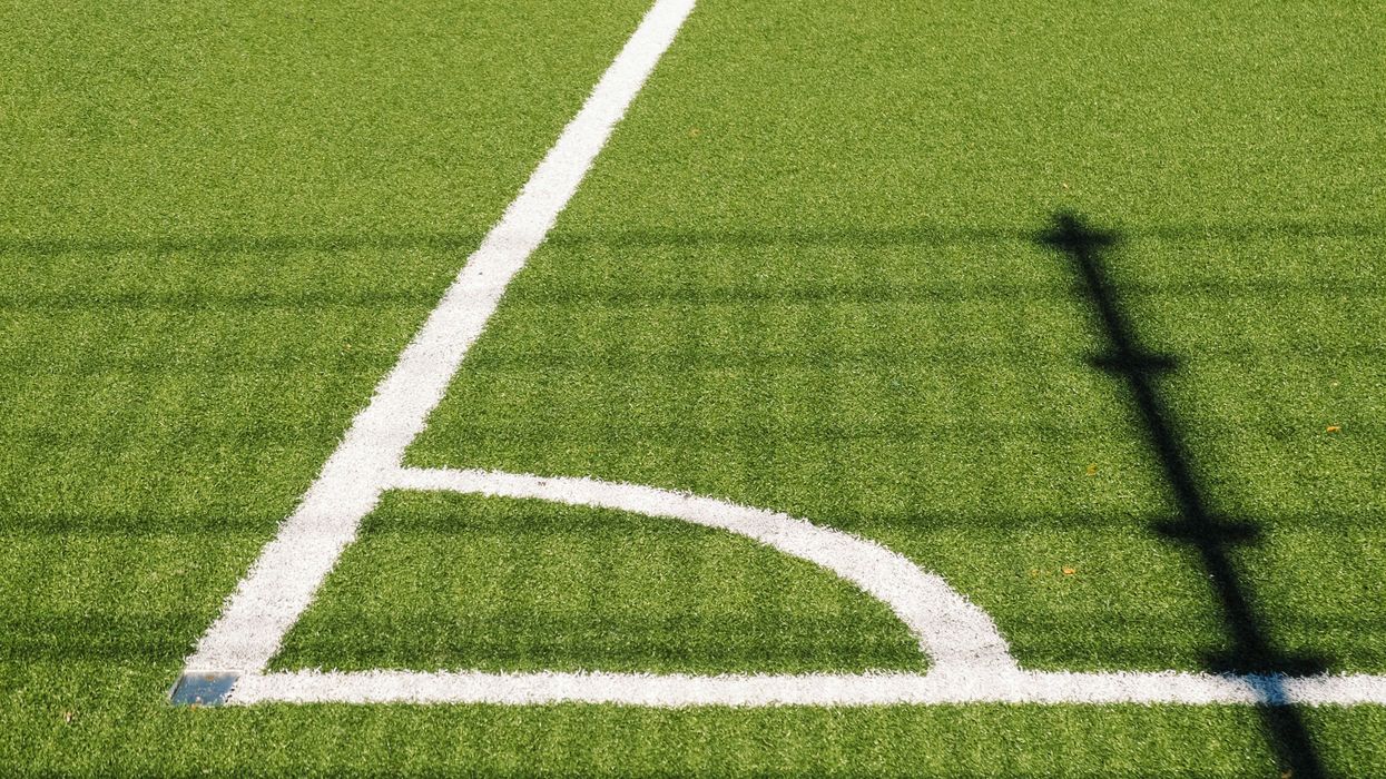 white sports lined turf