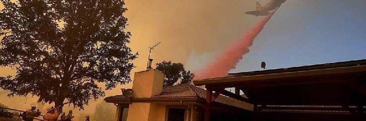 wildfire retardants being sprayed by plane