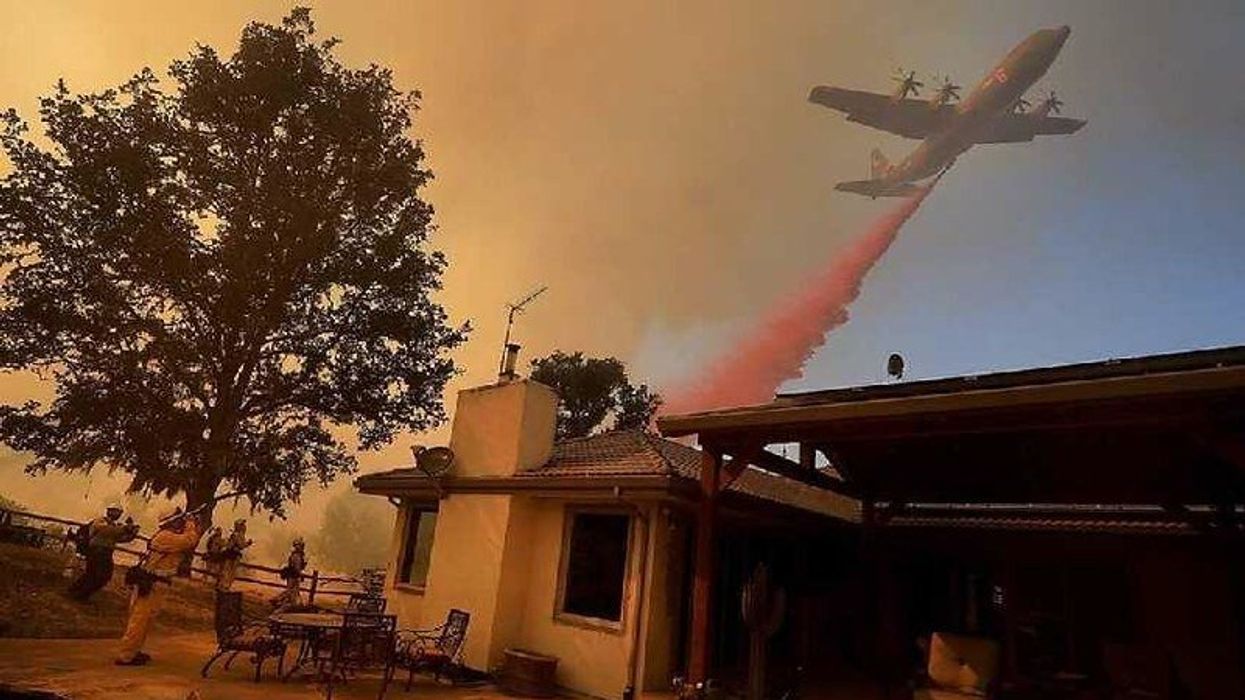 wildfire retardants being sprayed by plane