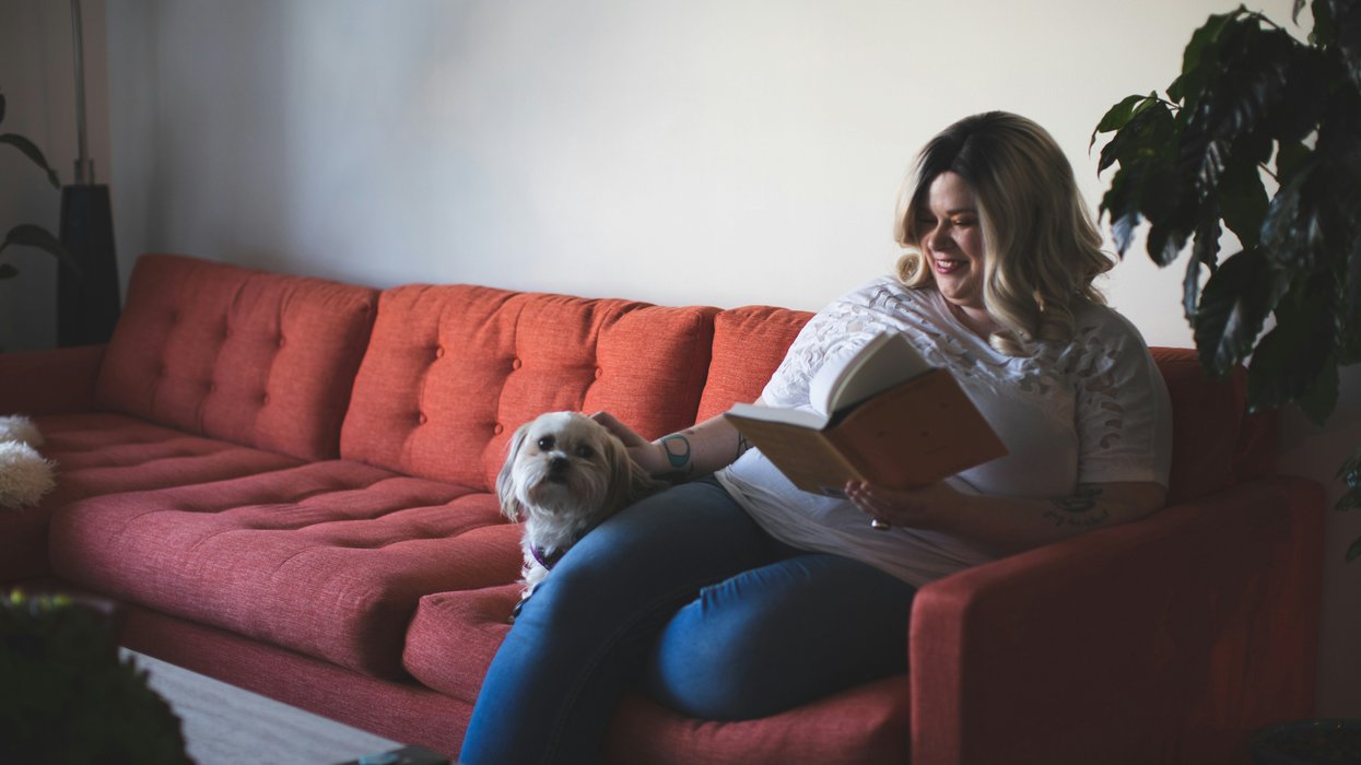 woman and dog on sofa