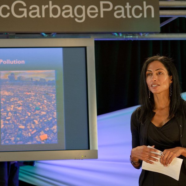 woman presenting on the plastic pollution crisis