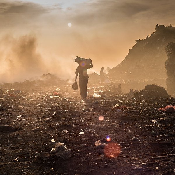 worker walking in a landfill